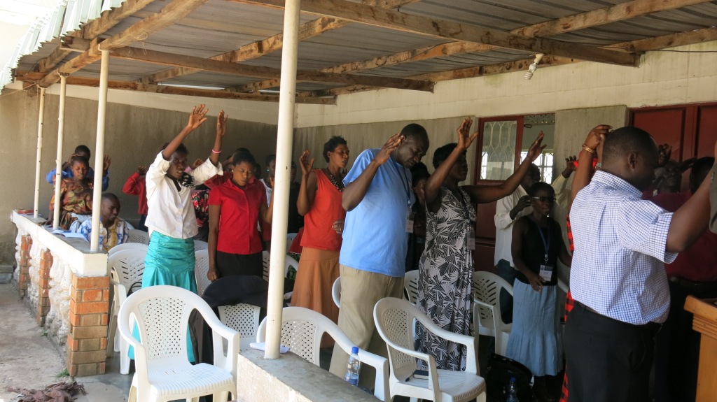 PASTORS PRAYING IN UNISON