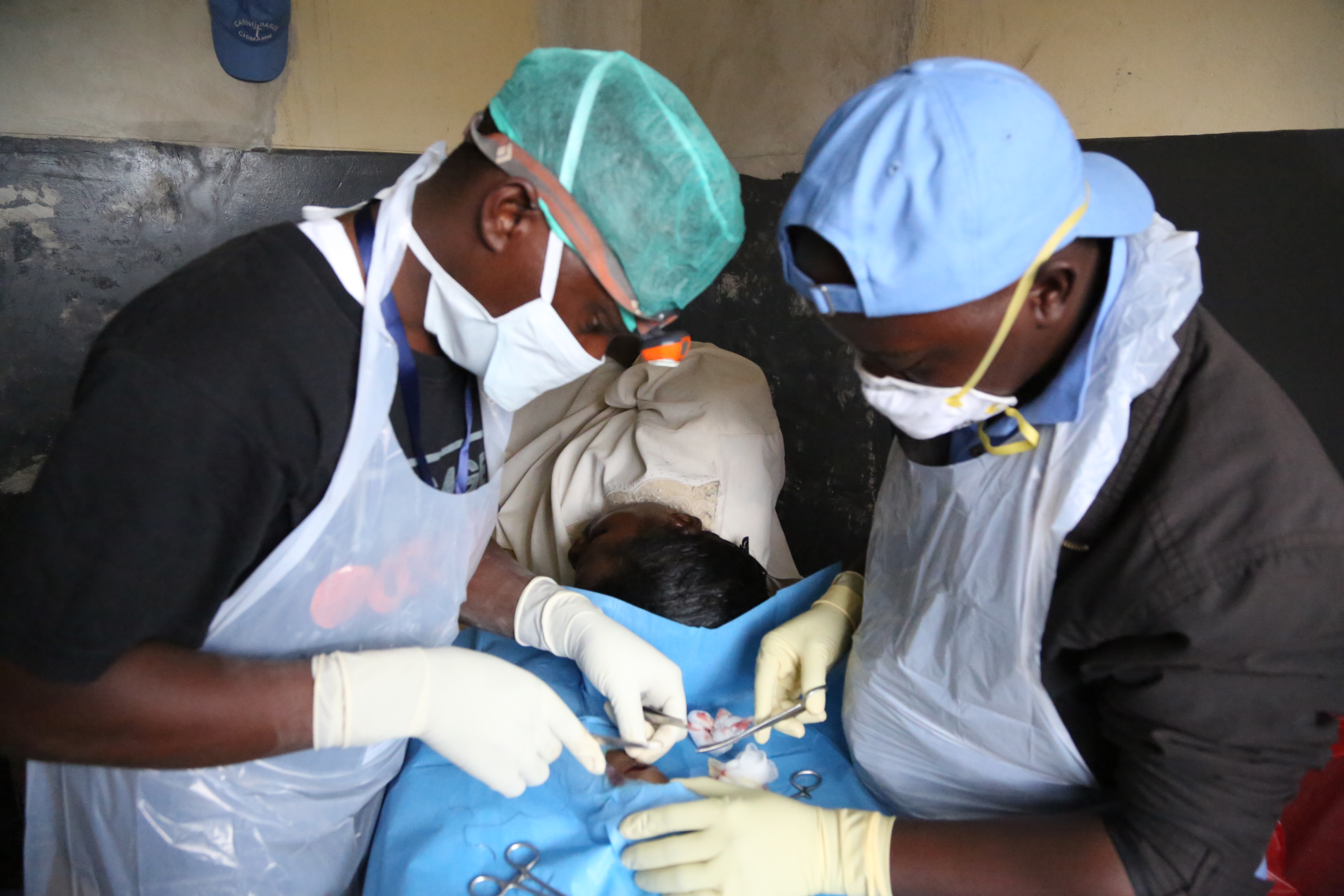 A PATIENT UNDER SURGERY AT THE CAMP